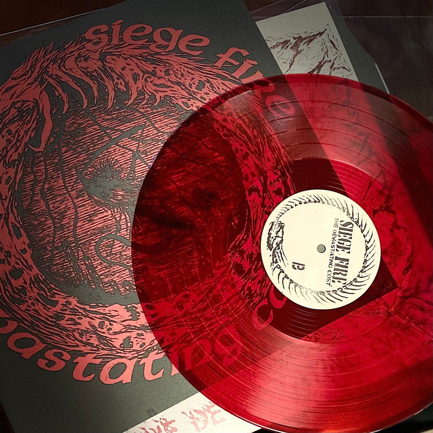 SIEGE FIRE – The Devastating Cost LP