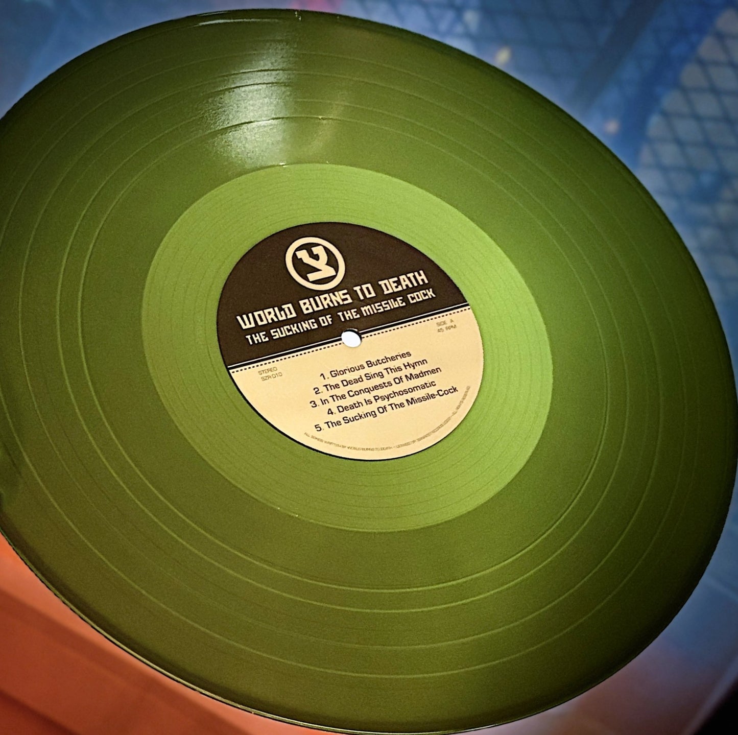 WORLD BURNS TO DEATH – The Sucking Of The Missile Cock LP (color vinyl)